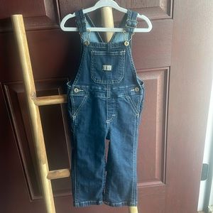 Wrangler  blue jean overalls .